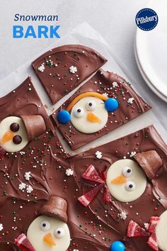 chocolate bark with frosting and decorations on it, including an angry bird face in the middle