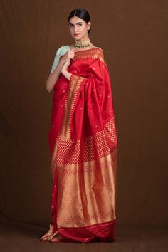 Red banarasi saree with floral woven pattern and geometric border.
Component: 1
Pattern: Handwoven
Type Of Work: Floral
Fabric: Pure Katan Silk
Color: Red
Other Details: 
Weight (in gms) approx. : 900
Note: Blouse worn by the model is not for sale
Occasion: Wedding - Aza Fashions Red Banarasi Saree, Banarasi Katan Silk Saree, Katan Silk Saree, Katan Silk, Banarasi Saree, Woven Pattern, Blouse For Women, Fashion App, Wedding Time