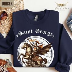 Vintage-style St. George Dragon Slayer Crewneck Sweatshirt, Gifts for Him, Catholic Christian Clothing, Sentimental Gifts - Etsy Fall Band Merch Sweatshirt With Band Logo, Fall Crew Neck Sweatshirt With Band Logo, Band Logo Cotton Sweatshirt For Fans, Fall Band Logo Crew Neck Sweatshirt, Band Merch Sweatshirt With Screen Print For Fans, Band Merch Long Sleeve Sweatshirt With Custom Print, San Judas Shirt, Band Logo Crew Neck Sweatshirt, Catholic St Joesph Tshirts