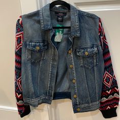 Jean Jacket With A Twist! Red And Blue Patterned Knit Sleeves. Never Worn And In Great Condition. Fits Small! Red Denim Jacket For Winter, Casual Red Denim Outerwear, Red Denim Trendy Outerwear, Red Trendy Denim Outerwear, Reworked Jacket, Tomato Color, Embroidered Jean Jacket, Boho Denim, Embroidered Denim Jacket