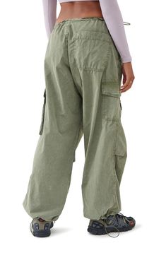 Bungee cords at the waist and cuffs let you adjust the fit of roomy cotton cargo joggers equipped with a mix of utility pockets. Exclusive retailer 30 1/2" inseam; 20" leg opening; 9 1/2" front rise; 15 1/2" back rise (size Medium) 100% cotton Machine wash, line dry Made in Turkey Climbing Pants Women, Hiking Vibes, Granola Style, Climbing Pants, Jeans Outfit Women, Trouser Outfit, Bungee Cords, Bdg Urban Outfitters, Utility Pockets