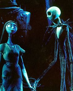 a woman in a dress holding hands with a skeleton