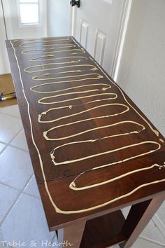 a wooden table with white lines painted on it