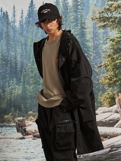 Editor's notesThe oversized fit parka jacket features three patch pockets and one pocket on the front, banding sleeves, and zipper and button closure. The four pockets on the front makes it practical and perfect for outdoor activity.- Oversized fit- Drawstring on hood- Zipper and button closure- Banding sleeves- Four pockets on the frontMeasurements(in.)M / L - Length: 39.4 in. / 40.2 in.- Shoulder: 25.2 in. / 25.8 in.- Chest: 30.7 in. /  31.7 in.- Sleeve Length: 24.2 in. /  24.8 Black Long Coat For Streetwear, Spring Long Coat Parka With Pockets, Black Urban Utility Jacket With Cargo Pockets, Long Sleeve Techwear Parka For Streetwear, Black Techwear Parka For Fall, Casual Long Windbreaker For Fall, Techwear Style Parka For Streetwear, Black Techwear Utility Jacket With Pockets, Military Style Windbreaker With Pockets For Outdoor