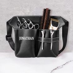 Custom Hairdresser Scissor Bag - This personalized leather waist pouch is perfect for hairstylists and barbers. Customize it with your name or a special message to add a unique touch to your hairdressing essentials. Featuring a durable leather design, multiple pockets for scissors, combs, and clips, and a convenient waist belt for easy access, this bag is a must-have for salon professionals. Ideal for travel, home, or salon use, keep your tools organized and within reach with this stylish scissor bag. Item specifics: Style: Custom Hairdresser Scissor Bag Water Resistant: Yes Measurements Size: 21.5*20*24CM(8.46*7.87*9.45INCH) Material: Leather Engraved Necklace Mothers, Wedding Gifts For Groomsmen, Promise Rings For Couples, Waist Pouch, Monogram Ring, Tool Belt, Mothers Necklace, Monogram Necklace, Engraved Jewelry