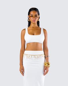 This white bra top is a need not a want 🙌 Made from jersey fabric and complete with a squared scoop neck, this closet essential is the perfect versatile piece for any occasion - from lounging at home to getting drinks with the girls 🤍 White Cropped Tank Top For Night Out, Seamless Scoop Neck Tank Top For Party, White Seamless Party Top, Trendy White Square Neck Crop Top, Chic White Scoop Neck Crop Top, White Bra Top, Shell Belt, White Bra, Black Off Shoulder