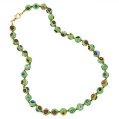 Add a touch of Venetian glamour to your look with this elegant Murano Millefiori necklace. Centuries-old Murano glass technique perfected by Italian master craftsmen is used to create colorful mosaic effect that is fun and trendy, yet classic and timeless. This Venetian necklace is a unique accessory that will brighten up your look and your day. Measurements: Each necklace measures 16 inches in length and comes with an attractive velvet pouch and a certificate of authenticity. Because each Muran Colorful Mosaic, Italian Leather Handbags, Artisan Jewelry Necklaces, Murano Glass Jewelry, Glass Christmas Tree Ornaments, Handcrafted Artisan Jewelry, Handmade Handbags, Christmas Figurines, Velvet Pouch