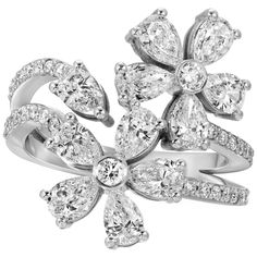 This elegant 18k white gold flower ring captures the essence of timeless beauty and sophistication. Adorned with 44 natural diamonds, it sparkles with every movement, making it the perfect accessory for special occasions or everyday luxury. The intricate floral design adds a delicate touch, while the 2.05 carat weight ensures a brilliant shine that will leave a lasting impression. Ring Information Diamond Type : Natural Diamond Metal : 18K Metal Color : White Gold Diamond Carat Weight : 2.05ttcw Luxury Dazzling Diamond White Flower Ring, Gold Flower Ring, Skin Products, Jewelry Rings Diamond, Flower Ring, Gold Flowers, High Jewelry, Flower Jewellery, Metal Color