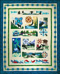 a quilted wall hanging with animals and trees on it's sides, including the letter