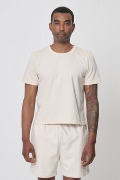 Tailored Trash Tee — Everybody.World Fitted Cotton T-shirt For Summer, Stretch Organic Cotton Casual T-shirt, Casual Stretch Organic Cotton T-shirt, Basic Stretch Organic Cotton T-shirt, Everyday Conscious Style Crew Neck Tops, Fitted Basic Organic Cotton Top, Fitted Basic Top In Organic Cotton, Fitted Organic Cotton Short Sleeve T-shirt, Fitted Organic Cotton T-shirt