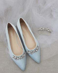 "Slip on pointy toe flats embellished with sparkly row of rhinestones across the toe for the extra glam. Comfort, beauty and feminine in one style. Details: COLORS AVAILABLE: White, ivory, off white, light blue, pink, aqua blue, dusty pink, champagne and royal blue UPPER: Synthetic upper and lining MATERIALS: Mandmade outsole STYLE NAME: VANITA SIZE FIT: RUNS LARGE, ORDER HALF SIZE DOWN FROM YOUR NORMAL SIZE Not sure of which size to purchase? Shoes measurements are as follow: (Please note measu Alternative Wedding Shoes, Wedding Something Blue, Shoes Light Blue, Flower Girl Shoes, Light Blue Wedding, Wedding Shoes Bride, Something Blue Wedding, Satin Shoes, Wedding Flats