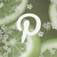 an image of lemon slices and flowers with the letter p on it's side