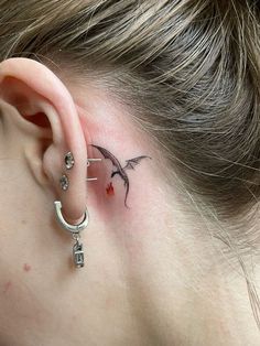 Dainty Fantasy Tattoos, Small Game Of Thrones Tattoo Ideas, Fantasy Tattoos Ideas, Harry Potter Tattoos Behind Ear, Small Hand Dragon Tattoo, Dragon Tattoos Behind The Ear, Koi And Moon Tattoo, Small Dainty Dragon Tattoo, Vine Tattoos Behind Ear