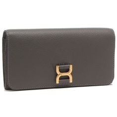 Chloe Ladies Wallets. SKU: CHC23AP098I31. Color: Elephant Grey. Chole Marcie Long Flap Women Wallet. The Marcie flap wallet features a snap button closure and includes 1 internal zippered pocket, 2 bill compartments, and 6 card slots. Its luxurious design is enhanced by metal accents on the flap. Gray Handbags, Versace Watch, Fine Pens, Women Wallet, Cheap Gifts, Fragrance Gift Set, Luxurious Design, Denim Shoes, Metal Accents