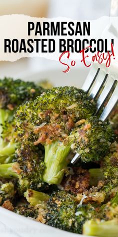 a close up of a plate of broccoli with a fork stuck in it