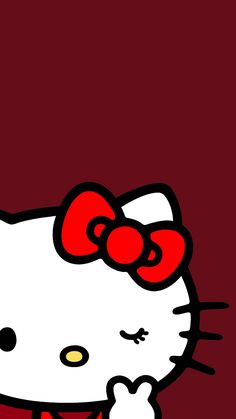 a hello kitty wallpaper with a red bow on it's head and eyes