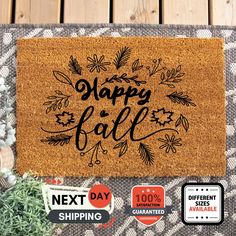 a happy fall door mat with the words next day on it, surrounded by other stickers