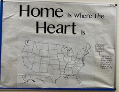 a bulletin board with a map of the united states and words written on it that read home is where the heart is