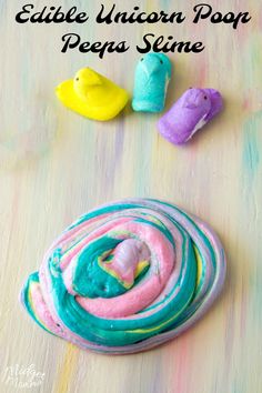 colorful play dough on a table with three small birds