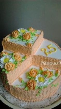 a three tiered cake with flowers on the top and bottom is decorated in burlap