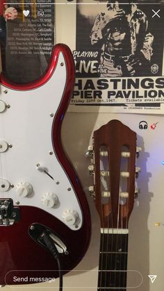 a red and white electric guitar is on display