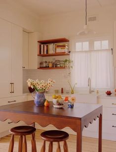 the kitchen is clean and ready to be used for cooking or eating, as well as other things