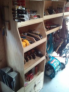 a garage filled with lots of tools and equipment in it's storage area,