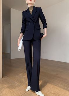 Make a statement with the Linette Double Breasted Blazer Pants Suit. Elegant and sophisticated, this two-piece set features a deep navy color and a slimming double-breasted cut. Show off your refined taste and elevated style with this luxurious suit that is perfect for any occasion. Blazer: Double Breasted button closure Notched lapels Long sleeves Front flap pockets Pants Zip fly with button closure Side slant pockets Cropped length - Polyester, spandex- Item #43194- Women's blazer & pants suit Double Breasted Outfit Women, Women’s 3 Piece Suit, Blazer And Pants Set Women, Women’s Suits, Formal Blazer Outfits, Double Breasted Blazer Outfit Women, Dark Blue Suit Wedding, Female Suits, Estilo Kardashian