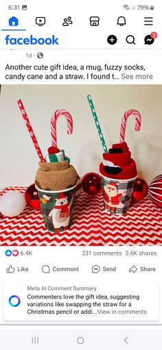 two cups filled with candy canes on top of a table