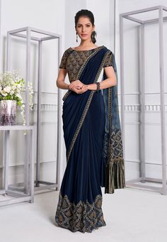 Navy blue lycra festival wear saree 21511  Desc:  Color : Navy Blue Fabric : Lycra   Net Work : Embroidery Wash Care : Dry clean Sleeve Style : Short Sleeve Long Sleeves : Done only in Custom Stitch Sleeves Lining : Done only in Custom Stitch Bust Size : 32 to 40 Inches Occasion : Kitty Party   Sangeet   Party Wear   Engagement   Reception   Ceremonial   Baby Shower. With Express Free Shipping and Custom Stitching, Buy Indian Wedding Party Wear Saree Navy blue lycra festival wear saree 21511 onl Saree Navy Blue, Royal Blue Saree, Indian Wedding Party, Navy Blue Saree, Reception Saree, Bridesmaid Saree, Wedding Party Wear, Applique Work