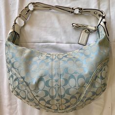 Beautiful Light Blue Coach Bag. Was Given To Me As A Gift But I Never Used It. After Looking At It To Take Pictures I Realized The Gift Giver Bought It Used Because This Purse Has Never Seen Daylight With Me. There Are Minor Stains On The Bottom Of The Bag And Around The Zipper (Shown In Pics). There Is A Stain On The Big Pocket In The Interior (Shown In Pics). Blue Coach Bag, Blue Coach, Big Pocket, Gift Giver, Coach Shoulder Bag, Coach Bag, Take Pictures, Beautiful Lights, The Gift