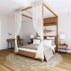 a canopy bed with white curtains in a bedroom