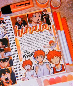 an open notebook with pictures of people on it and markers, pencils and marker pens