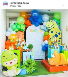 a birthday party with balloons and decorations