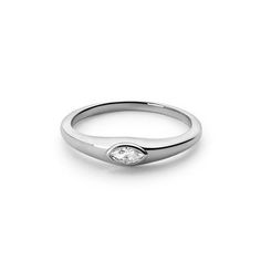 Add some sparkle to your look with the Maddi Crystal Eye Ring. This sleek and stylish ring features a single cz marquise, adding a touch of elegance to any outfit. Perfect for everyday wear or special occasions. Silver Marquise Stackable Rings, Silver Marquise Minimalist Rings, Minimalist Marquise Silver Rings, Minimalist Silver Marquise Ring, Modern Marquise Cut Diamond Ring, Elegant Marquise Cut Crystal Ring, Silver Marquise Diamond Ring With Single Diamond, Marquise Stackable Rings For Anniversary, Anniversary Marquise Stackable Rings