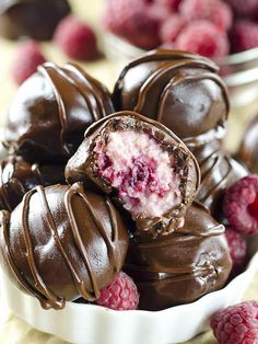 chocolate covered raspberry truffles in a bowl