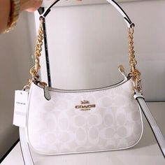 Top Rated NWT Coach Teri Shoulder Bag In Signature Canvas (Super fast shipping), Womens Bags Handbags Coach Teri Shoulder Bag White, Coach Bag Collection, Cream Coach Bag, Teri Shoulder Bag In Signature Canvas, Coach White Shoulder Bag, Coach Terri Bag, Coach Studio Bag, Cute Coach Bags, Coach Bags Aesthetic