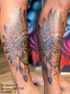 the legs are decorated with tattoos and headdress