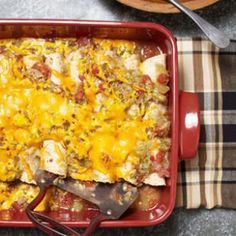 a casserole dish with meat, cheese and vegetables