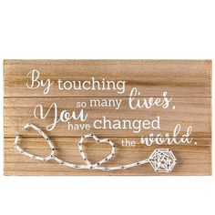 PRICES MAY VARY. 💛 Best Nurse Week Gift for Women and Men 💛 A sign with the meaningful quotes “By Touching So Many Lives You Have Changed The World”. Perfect gift for Thank you / Appreciation / Retirement / Registered and so on 💎 Best Birthday Gifts for A Family Member Who Is A Doctor or Nurse 💎 This adorable handmade string art stethoscope makes the perfect gift for him and her 🍀 Great Gift for the School Nurse 🍀 Sweet Heart patterns designed and handmade with cotton lines, good decor for 3d String Art, Best Gifts For Nurses, Nurse Retirement Gifts, Nurse Practitioner Gifts, Nurses Week Gifts, Retirement Gifts For Women, Word Signs, Doctor Gifts, Retirement Party