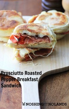 a close up of a sandwich on a cutting board with the words prosciutto roasted pepper breakfast sandwich