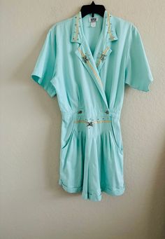 Rio Inc 80s Vintage Blue Barbie Jeweled Sequin Jumpsuit Romper  Size Large  Good condition There is a small stain on the right of the jumpsuit Please see all photos 100% cotton Lie flat measurements: Length from shoulder: 36 inches  Armpit to armpit: 21 inches  Shoulder to shoulder: 17 inches  Authentic See all photos Vintage Denim Blue Jumpsuits And Rompers With Pockets, Blue Retro Denim Jumpsuit, Barbie Jumpsuit, 80s Romper, Vintage Cotton Denim Jumpsuit With Button Closure, Blue Barbie, From The 80s Jumpsuits & Rompers, 80s Jumpsuit, Combi Short