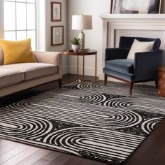 a living room with two couches, a chair and a rug on the floor