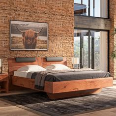 a bedroom with brick walls and a cow head mounted to the wall above the bed