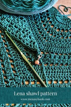 yarn and knitting needles sitting on top of a blue blanket with the words lena shawl pattern