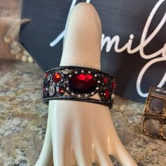 Chunky Beautiful Black Metal Lattice Style Design Hinged Bangle Bracelet . The Gemstones Are Vivid Red And Clear Resin Design . The Thickness Is 2.0 Inches Across . Well Made Metal ! Will Fit A Wrist Of 6 To 12 Inches . Adjustable Red Bracelet With Rhinestones, Elegant Red Metal Cuff Bracelet, Red Metal Cuff Bracelet, Adjustable Red Metal Cuff Bracelet, Red Adjustable Metal Cuff Bracelet, Red Rhinestone Bracelets For Party, Red Jeweled Bracelet For Party, Elegant Red Bracelets For Evening, Purple Crystal Bracelet