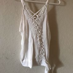 Tank Top - Color ( White) - Size Xs - Brand( Rebellion) - Condition ( Nwt) - Ties On Side - Lacy Design In Front White Cotton Tank Top With Tie Back, White Summer Top With Tie Back, White Tie Back Tank Top For Summer, White Tie-back Summer Top, White Tie Back Top For Day Out, White Tie-back Top For Beach, Casual White Tie Back Top, White Tie Back Top For Beach, White Tie Back Top For The Beach