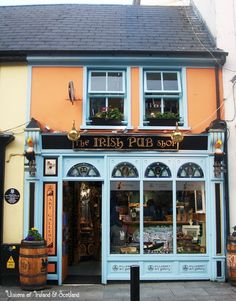 the irish pub shop is painted blue and orange