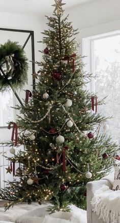 a decorated christmas tree in a living room