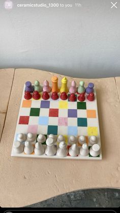 a chess board made out of ceramic tiles